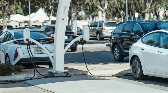 Electric vehicles charging at a charging station