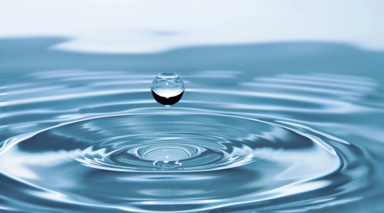 Water droplet splash in body of water