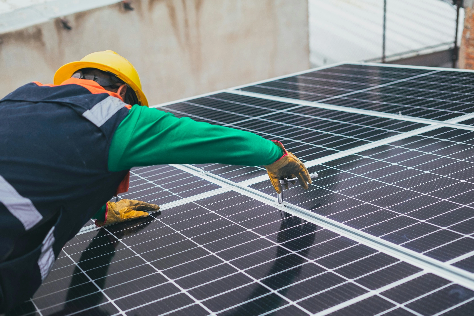 Man installing solar panel
